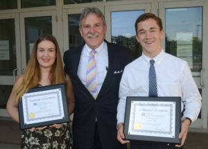 East hampton high school scholarship recipients and Senior Partner Christopher Kelley