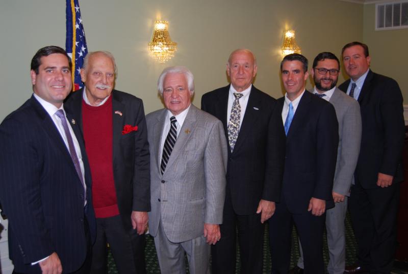 group photo LIMBA members, Suffolk DA Tim Sini, and Twomey Latham partner attorneys